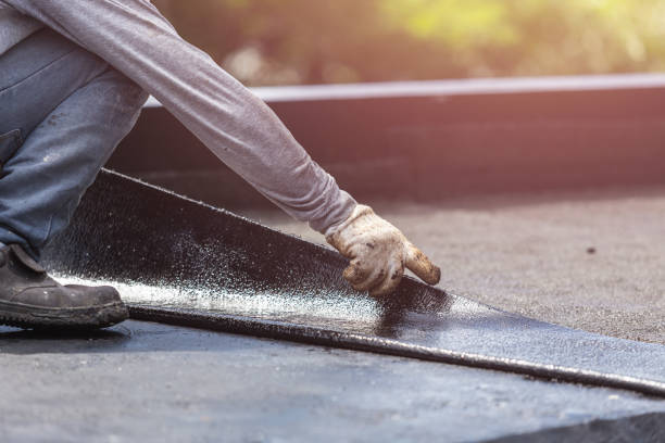 Professional Basement Waterproofing technician working in Jackson, MI